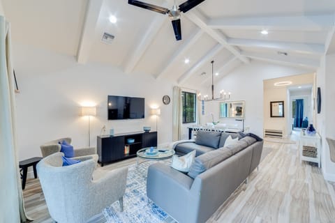Airy and modern living area with 13 foot ceiling