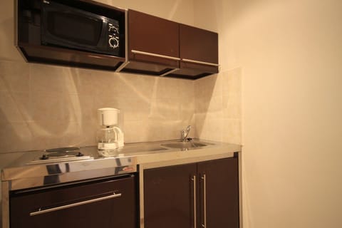 Fridge, microwave, cookware/dishes/utensils