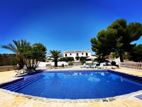 Outdoor pool, pool umbrellas, sun loungers