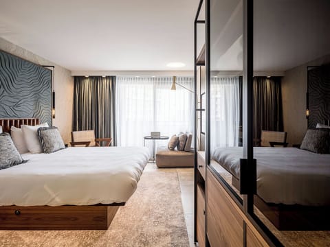 Dutch Delight | Premium bedding, in-room safe, blackout drapes, iron/ironing board