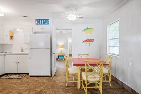 Bunk room/bathroom with laundry entrance.