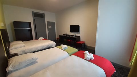 Family Room | Desk, blackout drapes, iron/ironing board, free WiFi