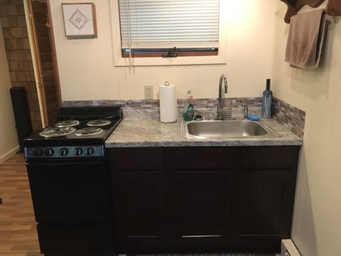 Kitchen area with stove/range 