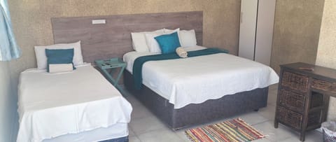 Family Room | Iron/ironing board, bed sheets