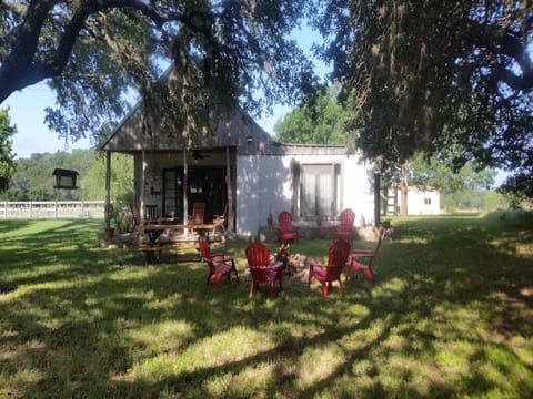 Come enjoy our Rustic River cabin under the oaks and steps from the cool river.