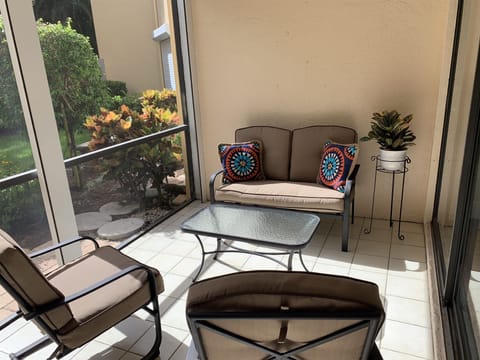 Screened in lanai offers great place to relax and read a book