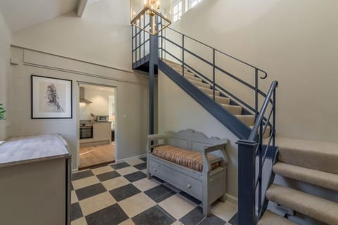 Marsh View and River View share an entrance way with a washing machine, tumble dryer and freezer