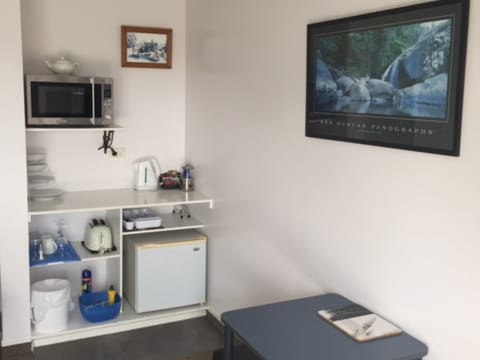 Studio Kitchenette | Private kitchenette | Microwave, electric kettle, toaster, highchair