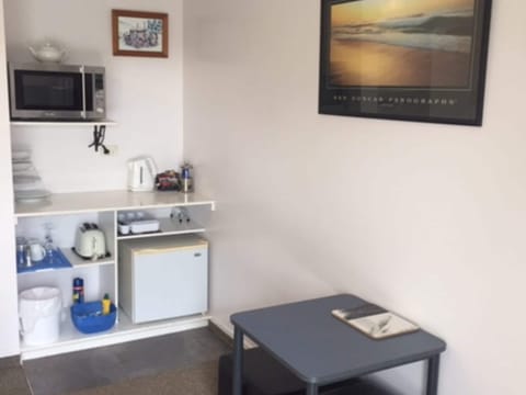 Studio Kitchenette | Private kitchenette | Microwave, electric kettle, toaster, highchair