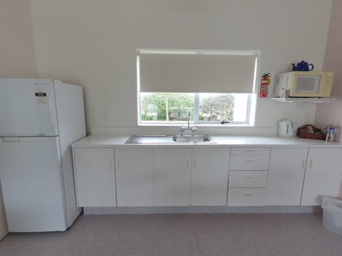 Two Bedroom Unit | Private kitchen | Microwave, electric kettle, toaster, highchair