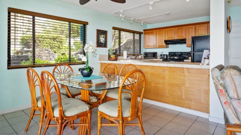 Open concept living. Indoor dining space positioned to enjoy the ocean view while sharing meals or planning your island adventures.