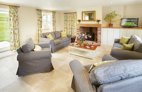 Ground floor:  Open plan sitting room with wood burning stove