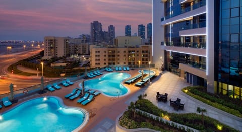 2 outdoor pools, open 7:30 AM to 8:00 PM, pool umbrellas, sun loungers