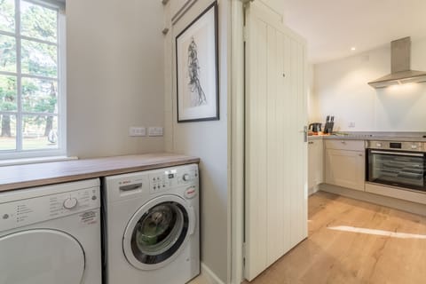 Ground floor: Utility area with washing machine and tumble dryer