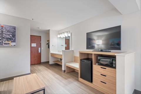 Premium bedding, pillowtop beds, desk, laptop workspace