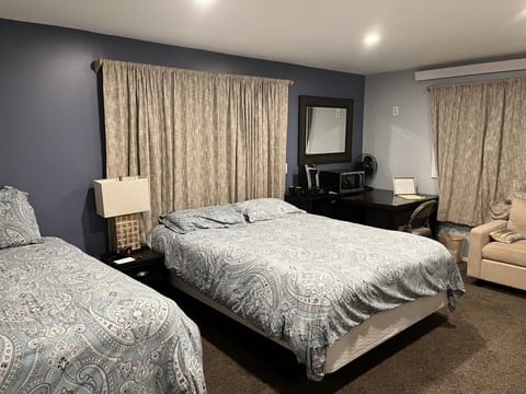 Spacious and comfortable 
1 Queen bed, 1 twin bed
Couch, table & chair