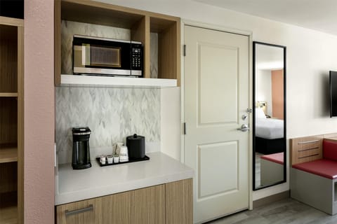 Room, 1 King Bed, Jetted Tub | Desk, laptop workspace, blackout drapes, iron/ironing board