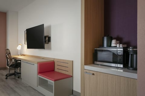 Desk, laptop workspace, blackout drapes, iron/ironing board