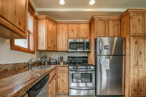 Fully furnished kitchen with stainless appliances