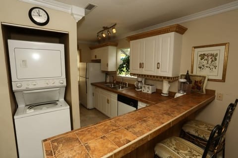 Laundry room in condo with Washer and Dryer.