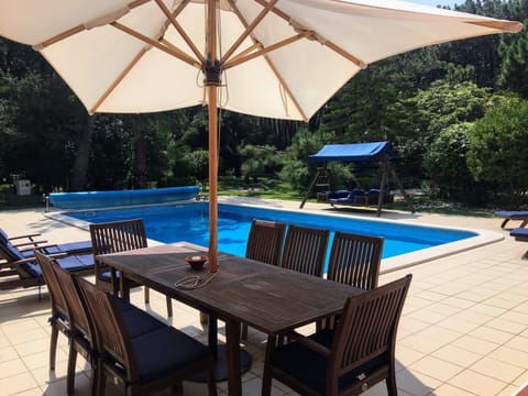Outdoor dining by the pool