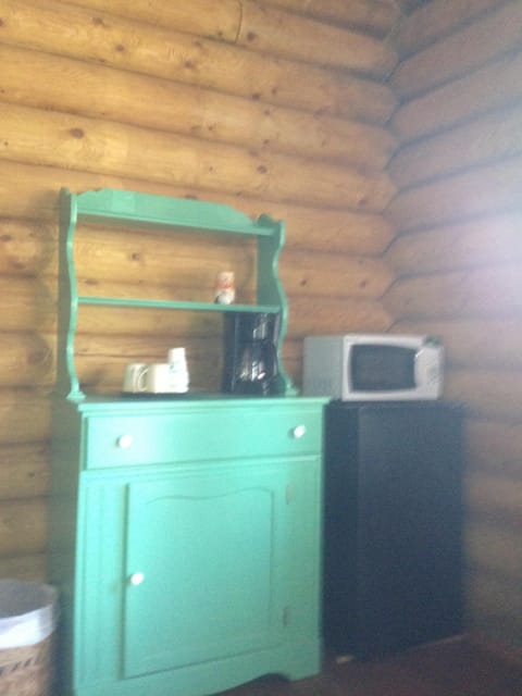 Complimentary coffee provided on the kitchenette cabinet in the Longhorn Cabin