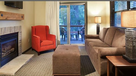 living room with balcony/patio