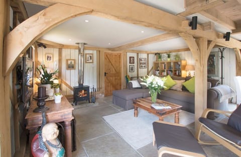 Ground floor: Open-plan sitting room with wood burning stove