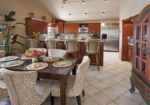 Gourmet Kitchen with Granite Counter Tops, showcasing Dual Appliances Throughout