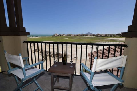 This 3-bedroom, 2-bath condo is nestled on the golf course with panoramic ocean and fairway views. It features a full kitchen, in-unit laundry, fireplace, and two community pools