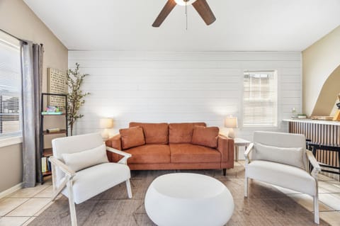 Enjoy your open space living room with cozy lights that set the perfect mood.