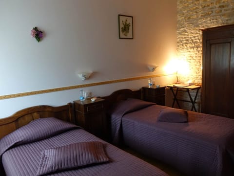 La chambre Vignes aménagée avec 2 lits séparés