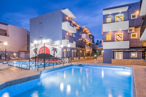 Seasonal outdoor pool, open 9:00 AM to 8:00 PM, pool umbrellas