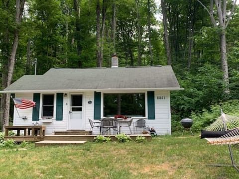 The cabin sits back from the road and has a yard for you to use. 