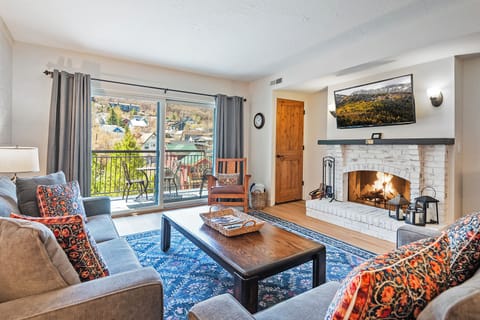 Living Room - Firelogs avail., Private balcony.