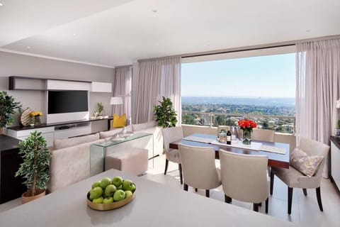 Luxury Apartment | Living area | 42-inch Smart TV with satellite channels, TV