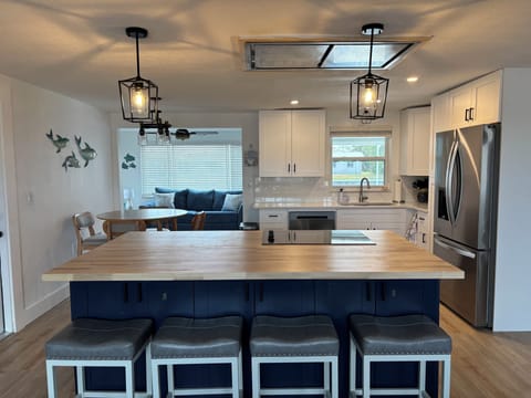 Hang out at the island while the chef cooks