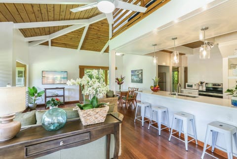 Enjoy seamless island living with a bright kitchen and bar seating just off the main living area.