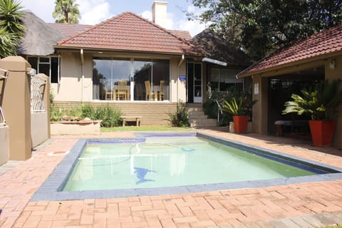Outdoor pool, open 10:00 AM to 10:00 PM, sun loungers