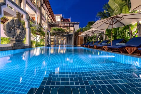 Outdoor pool, open 8:00 AM to 10:00 PM, pool umbrellas, sun loungers