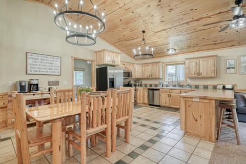 Dining room, kitchen, and complimentary coffee bar.