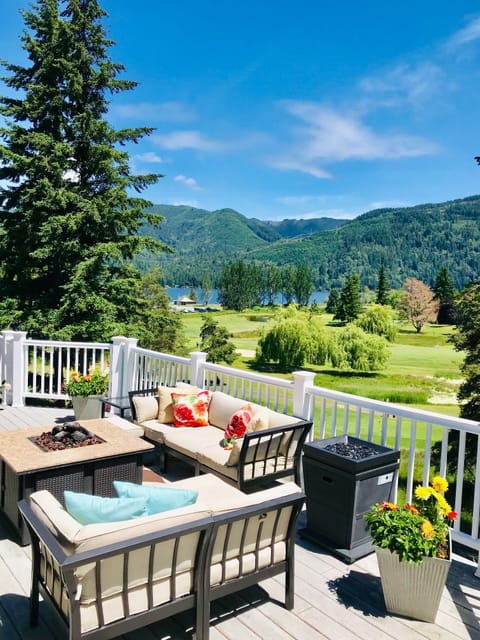 Largest deck in Sudden Valley with modern patio furniture and a fire pit. 