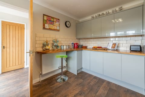 Ground floor: Kitchen with engineered wooden flooring