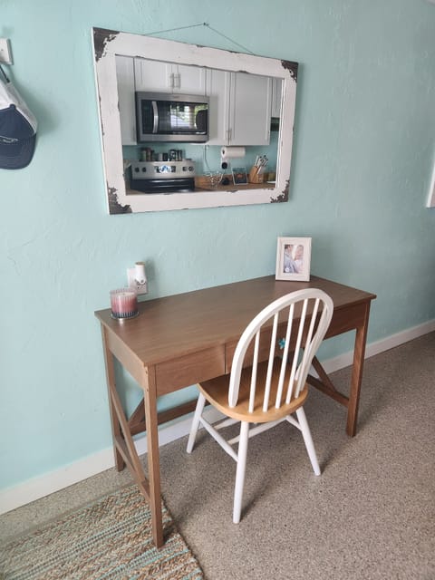 Desk area room for two monitors and a laptop
