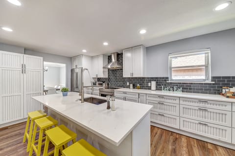 Updated opening kitchen with a microwave, dishwasher, stove, and oven