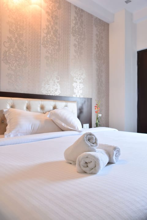 Blackout drapes, iron/ironing board, free WiFi, bed sheets