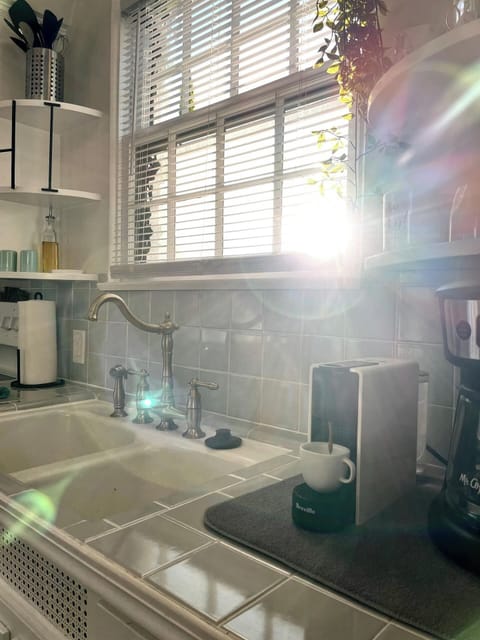 Kitchen - includes cooking utensils, pots, pans, etc. Oh did I mention there is a Mini Essenza Nespresso maker with complimentary pods provided? And a coffee bar?! 