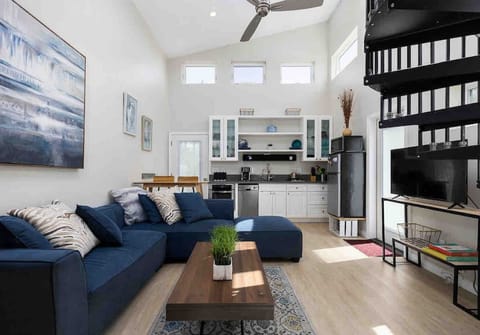 Unwind in our bright, cozy living room — the perfect spot for coffee and conversation.