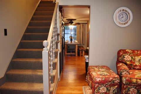 Staircase to bedrooms and half bath on 2nd story