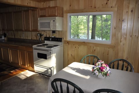 Enjoy Breakfast at the Table with Morning Sun Streaming Through